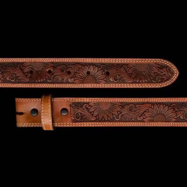 "Our Cypress Belt is a true testament to Southern grace and rugged style. This Western Belt is crafted & double lined with top-grain leather to ensure durability and longevity. The beautiful flowered tooling pattern is framed by a double stitched
